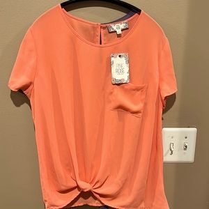 Size L. Peach front knot top.